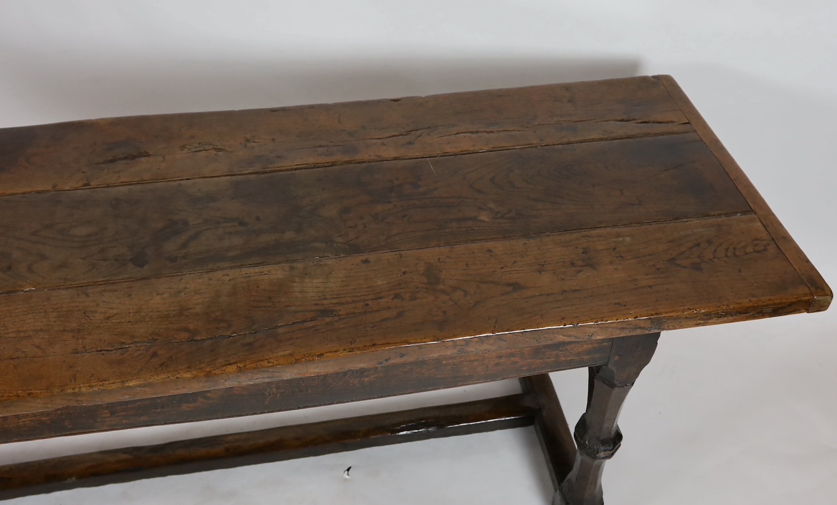 A Charles I oak refectory table, c.1630, 253 x 77cm, height 79cm